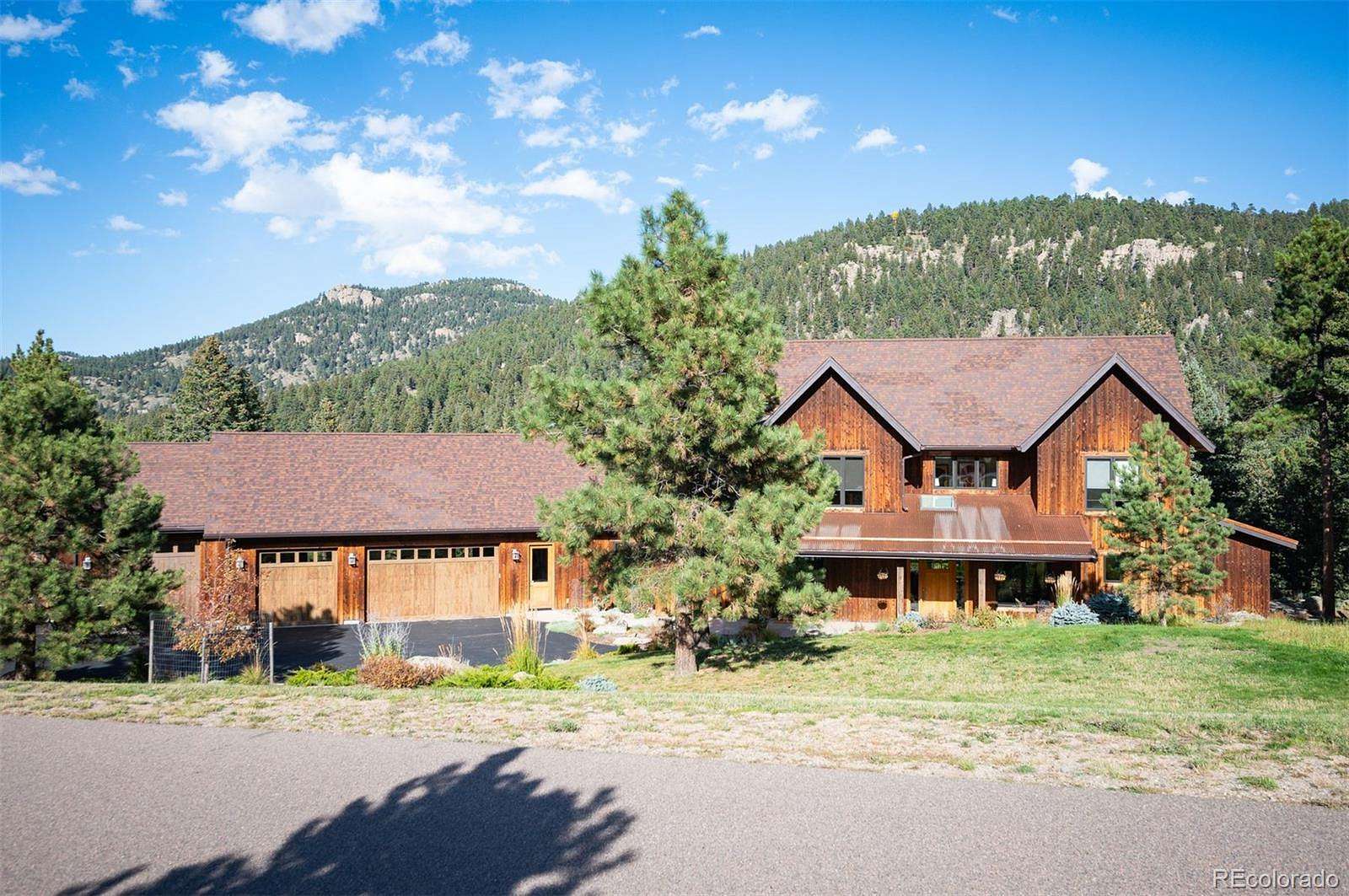 4.67 Acres of Land with Home for Sale in Evergreen, Colorado