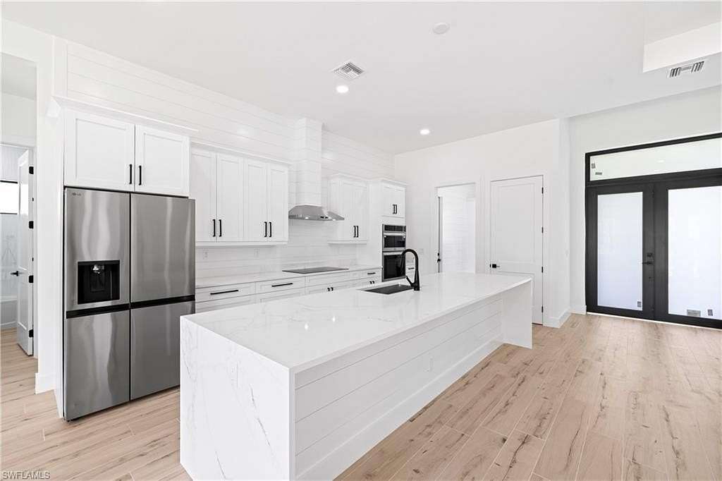 2.27 Acres of Land with Home for Sale in Naples, Florida