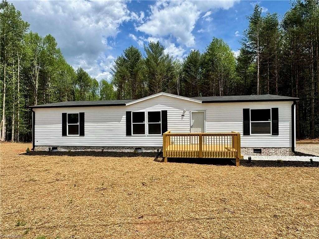 8 Acres of Land with Home for Sale in Hays, North Carolina