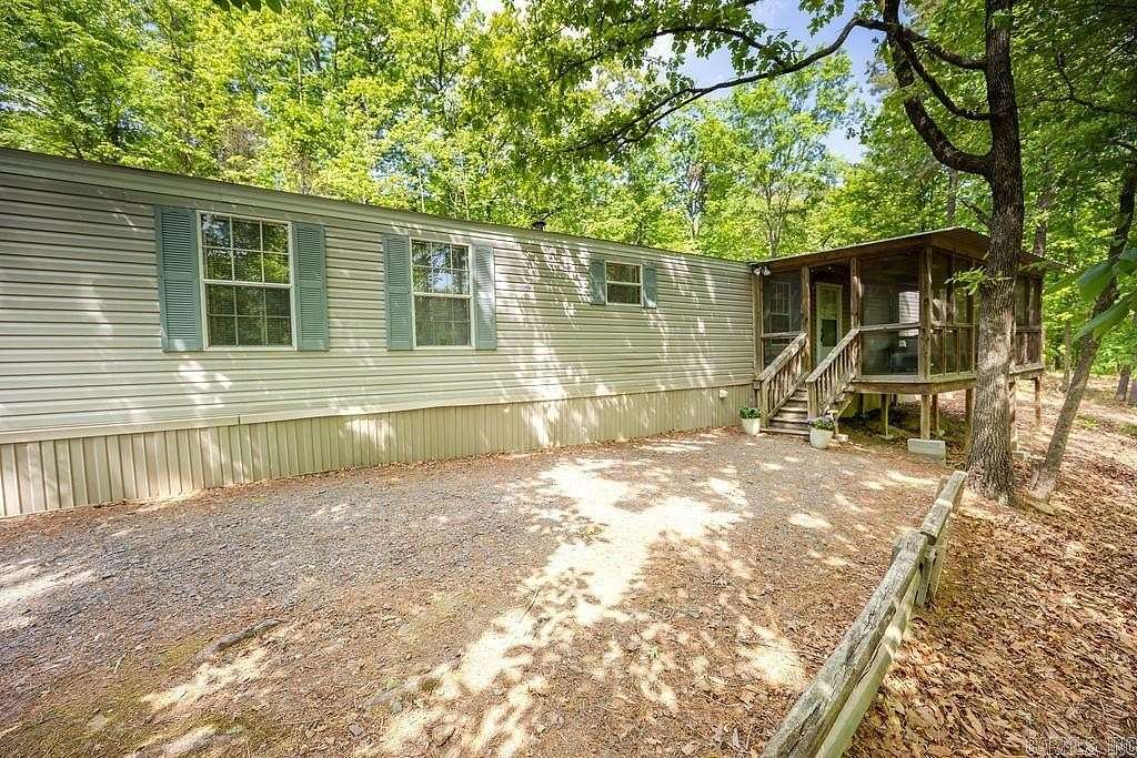 1.14 Acres of Land with Home for Sale in Higden, Arkansas