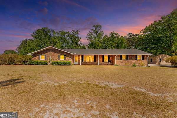 5.62 Acres of Land with Home for Sale in Ellabell, Georgia