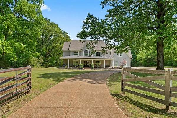 9.89 Acres of Land with Home for Sale in Arlington, Tennessee