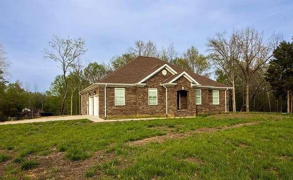 3.54 Acres of Land with Home for Sale in Hanson, Kentucky