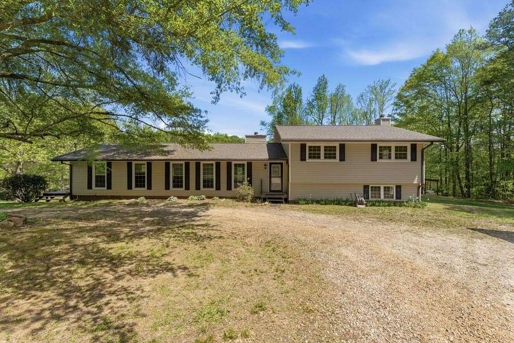 9.5 Acres of Land with Home for Sale in Roopville, Georgia