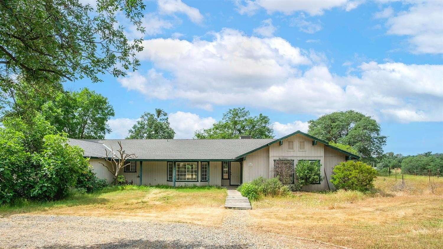 5.22 Acres of Land with Home for Sale in Auberry, California