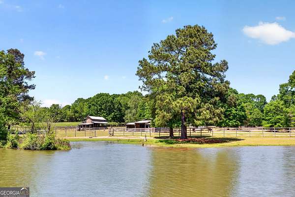 15.3 Acres of Land with Home for Sale in Brooks, Georgia