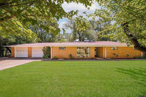 3.66 Acres of Land with Home for Sale in Hughes Springs, Texas