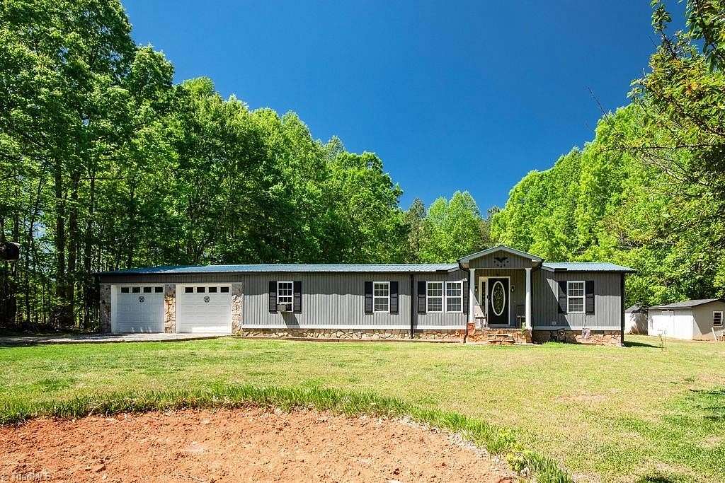 4.8 Acres of Land with Home for Sale in Pleasant Garden, North Carolina