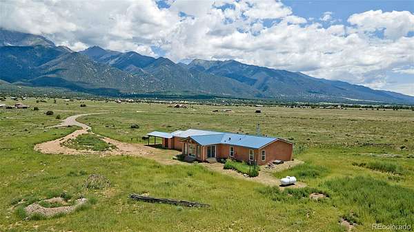 2 Acres of Land with Home for Sale in Crestone, Colorado