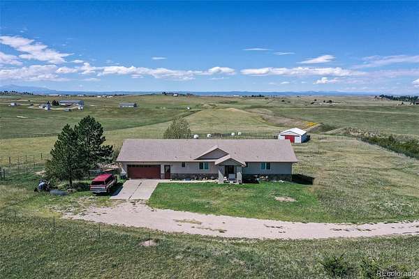 40 Acres of Agricultural Land with Home for Sale in Elizabeth, Colorado