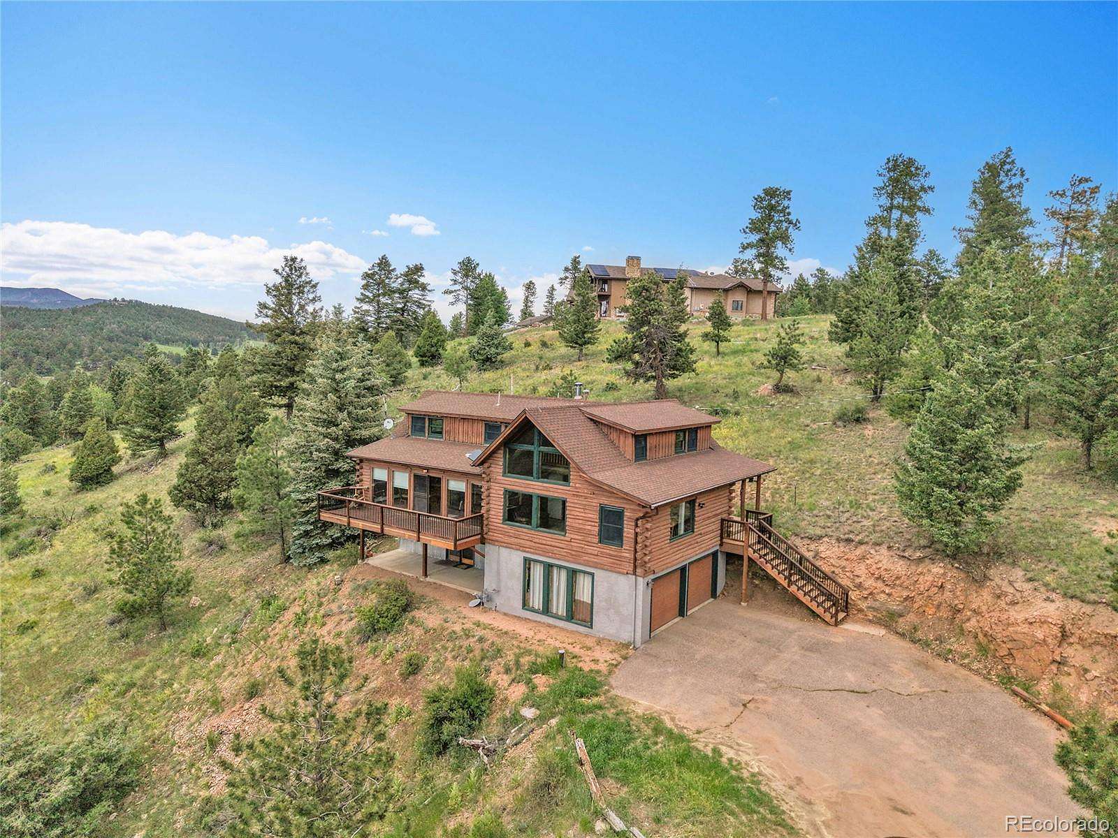 6.89 Acres of Land with Home for Sale in Conifer, Colorado
