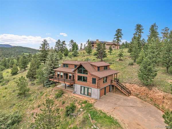6.89 Acres of Land with Home for Sale in Conifer, Colorado