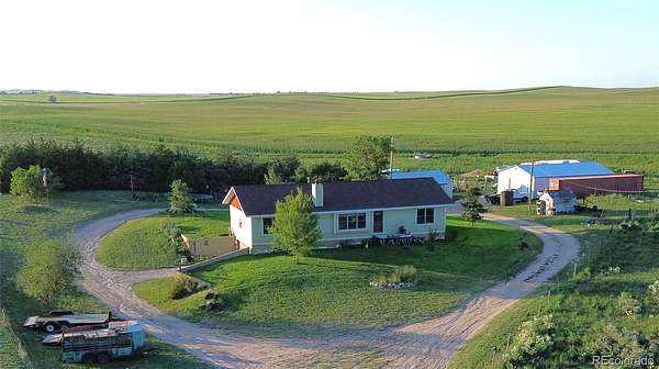 10.8 Acres of Land with Home for Sale in Holyoke, Colorado