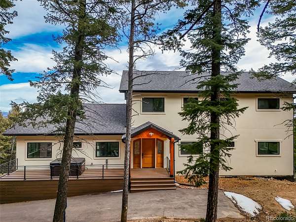 3.8 Acres of Land with Home for Sale in Evergreen, Colorado