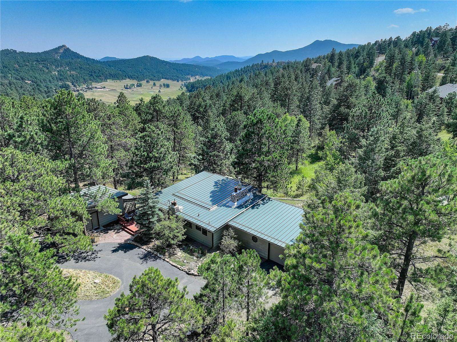 5.4 Acres of Land with Home for Sale in Evergreen, Colorado