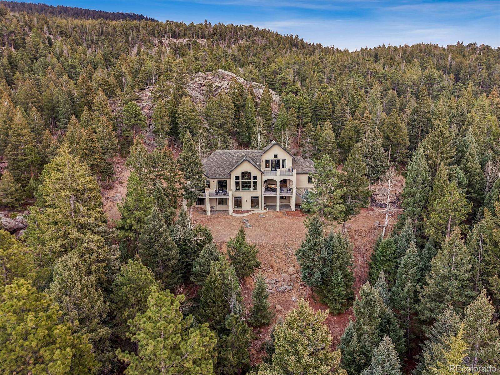 7.14 Acres of Land with Home for Sale in Evergreen, Colorado