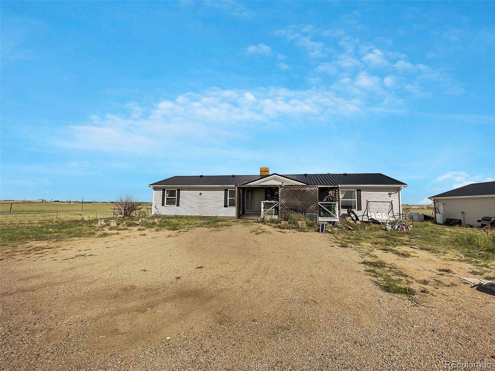 35.7 Acres of Land with Home for Sale in Byers, Colorado