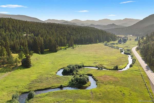 7.3 Acres of Land with Home for Sale in Evergreen, Colorado