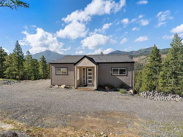 3.23 Acres of Land with Home for Sale in Evergreen, Colorado