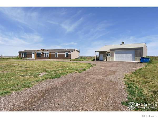 10 Acres of Land with Home for Sale in Briggsdale, Colorado