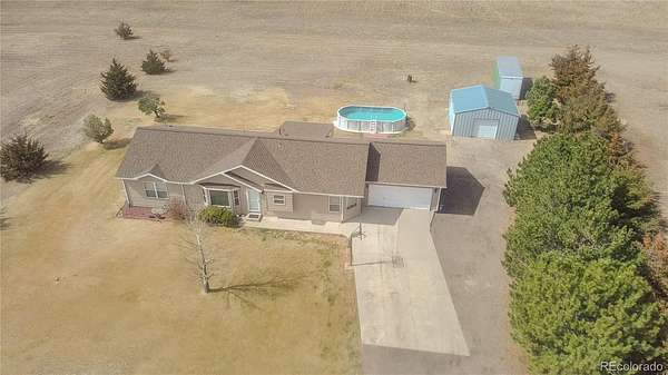 2.5 Acres of Land with Home for Sale in Strasburg, Colorado