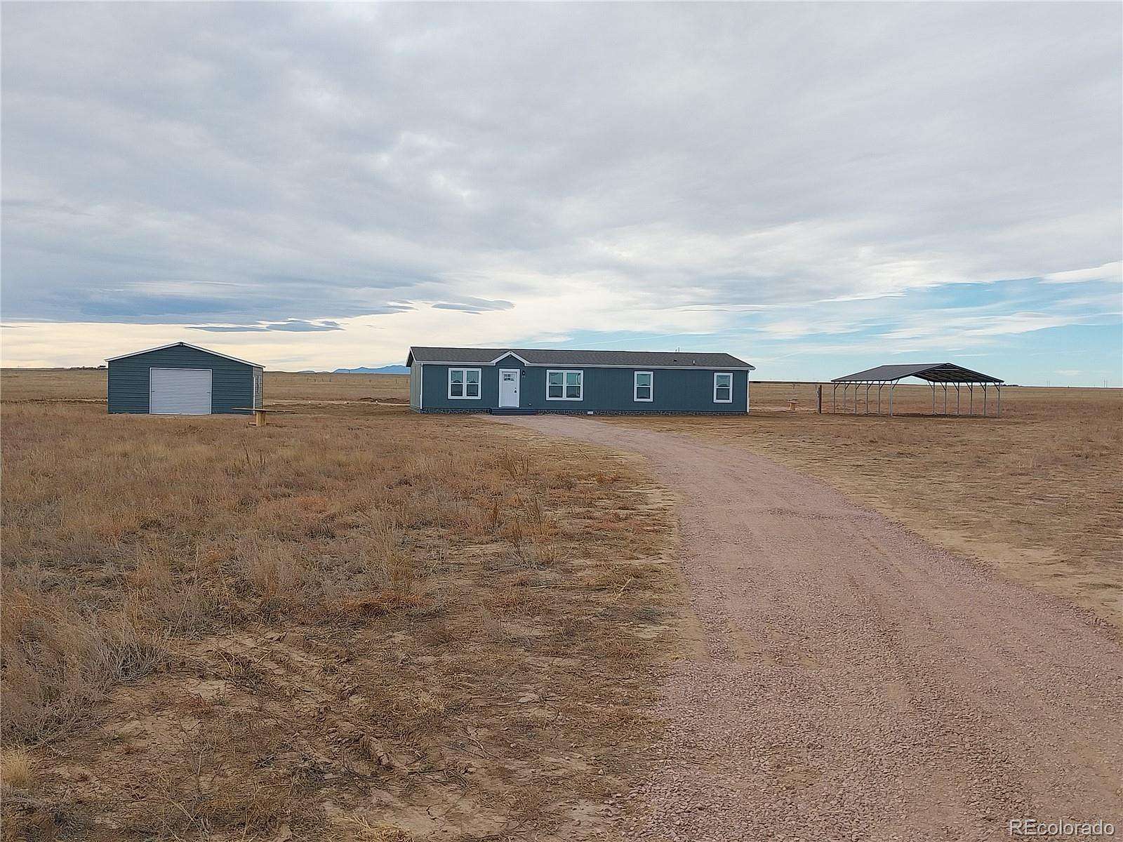 38.6 Acres of Agricultural Land with Home for Sale in Yoder, Colorado