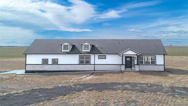 36.6 Acres of Agricultural Land with Home for Sale in Strasburg, Colorado