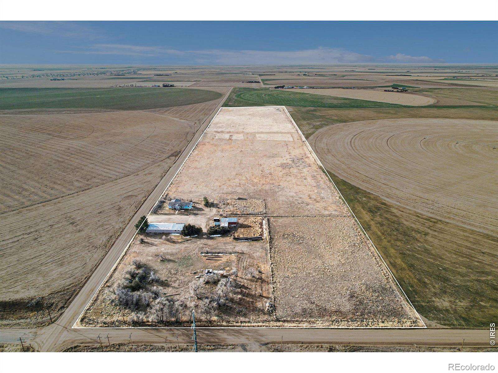 35 Acres of Agricultural Land with Home for Sale in Wiggins, Colorado