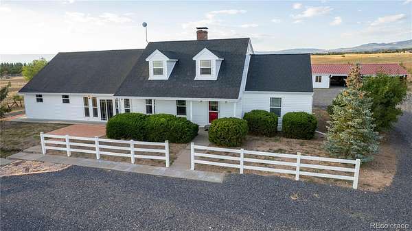 9.85 Acres of Land with Home for Sale in Hotchkiss, Colorado