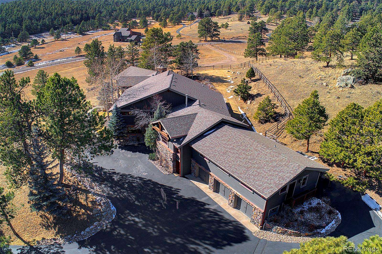 5.7 Acres of Land with Home for Sale in Evergreen, Colorado