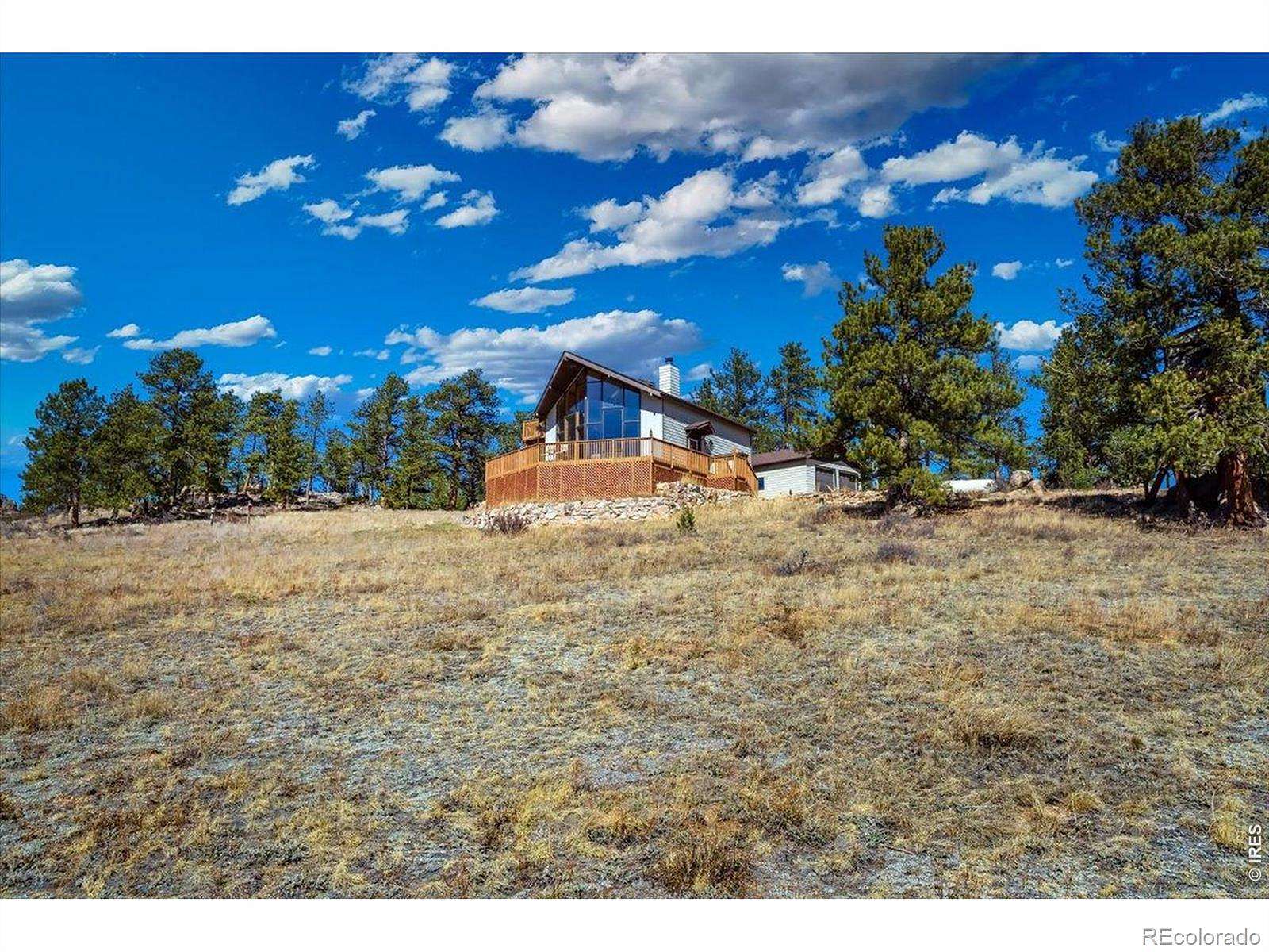 2.67 Acres of Land with Home for Sale in Red Feather Lakes, Colorado