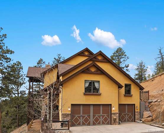 5.1 Acres of Land with Home for Sale in Woodland Park, Colorado