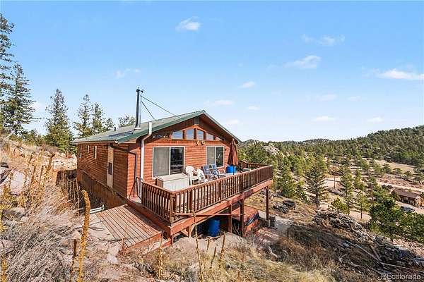 4.23 Acres of Land with Home for Sale in Red Feather Lakes, Colorado