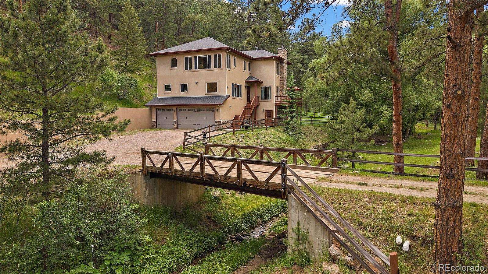 6.4 Acres of Land with Home for Sale in Evergreen, Colorado