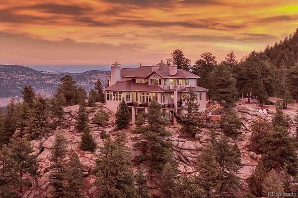10.7 Acres of Land with Home for Sale in Evergreen, Colorado