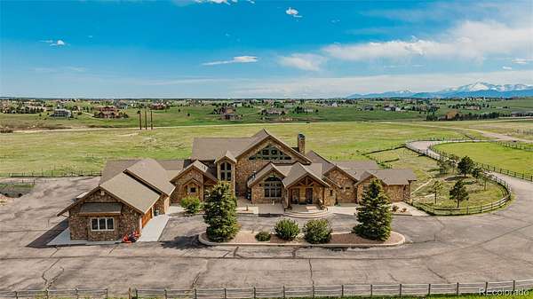 35 Acres of Agricultural Land with Home for Sale in Larkspur, Colorado