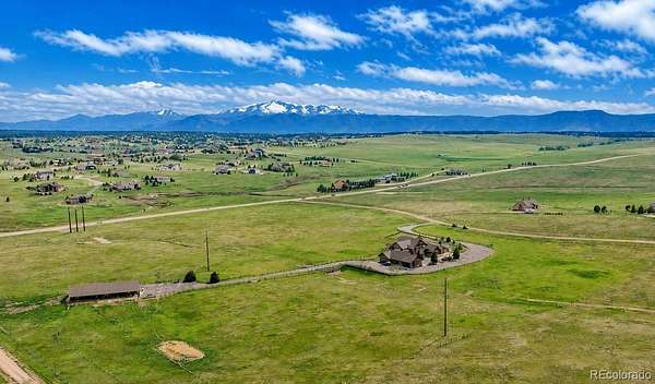 35 Acres of Agricultural Land with Home for Sale in Larkspur, Colorado