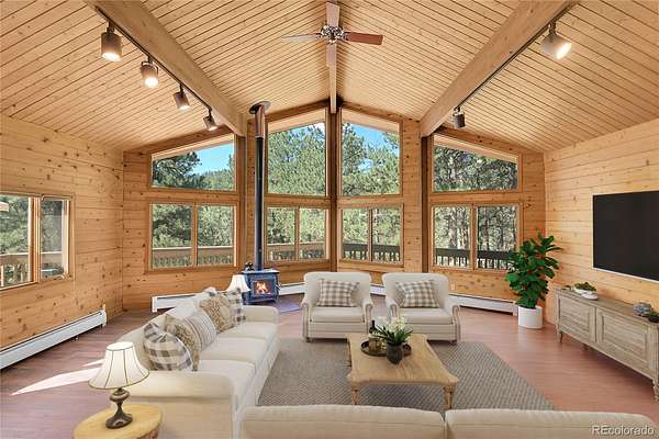 14.8 Acres of Land with Home for Sale in Evergreen, Colorado