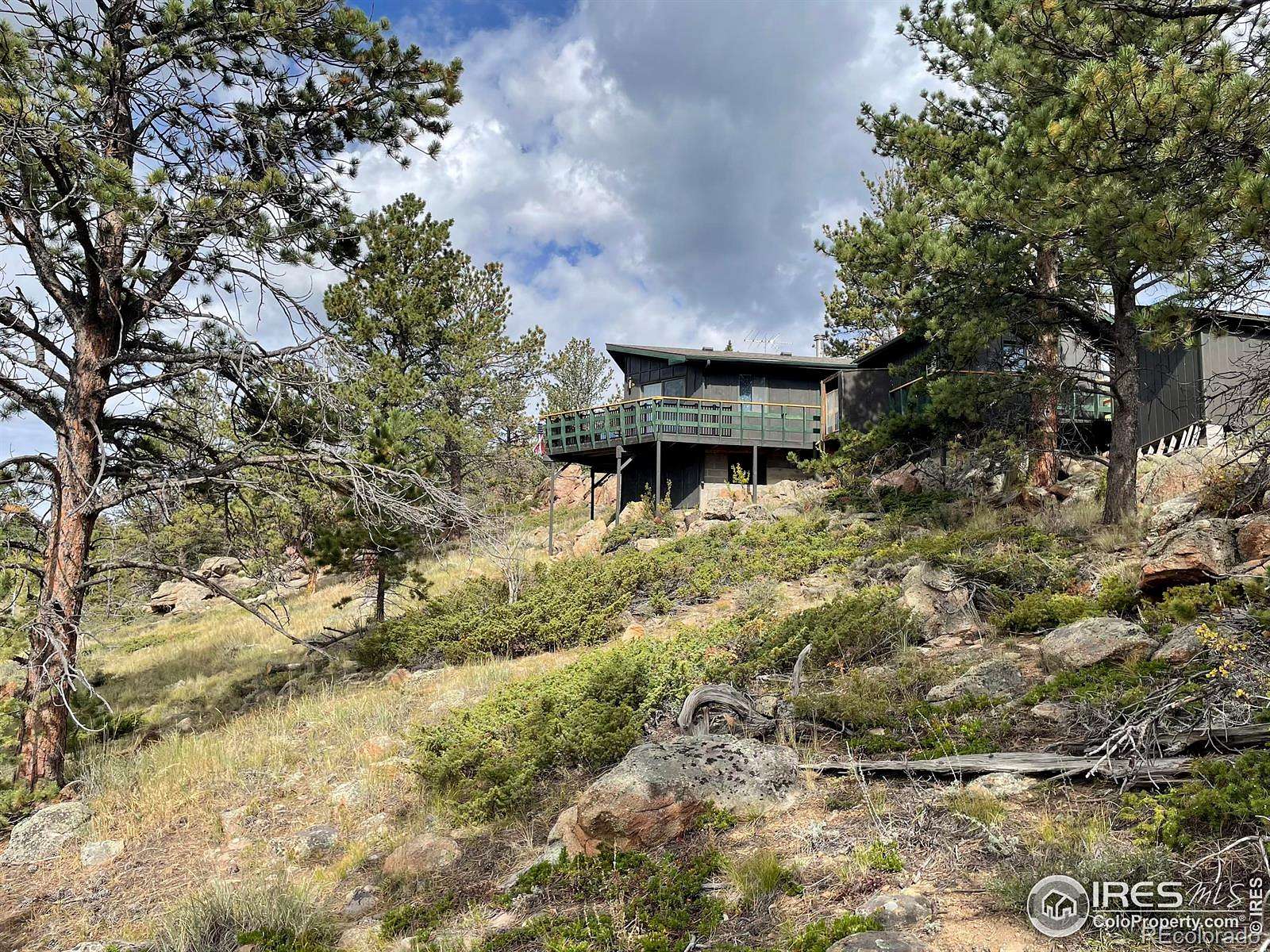 1.64 Acres of Land with Home for Sale in Red Feather Lakes, Colorado