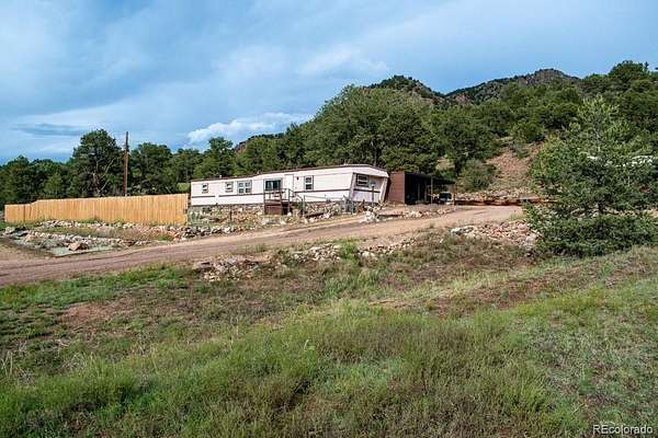 5.5 Acres of Land with Home for Sale in Cotopaxi, Colorado