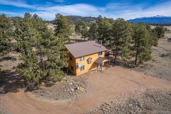 7.73 Acres of Land with Home for Sale in Guffey, Colorado