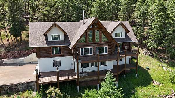 4 Acres of Land with Home for Sale in Larkspur, Colorado