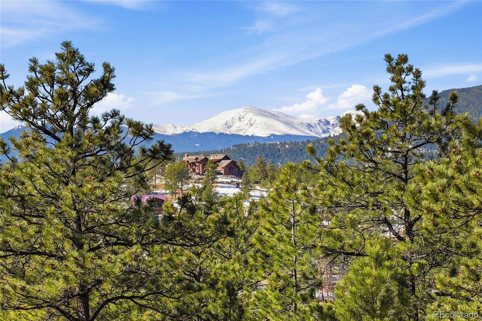 10 Acres of Land with Home for Sale in Evergreen, Colorado