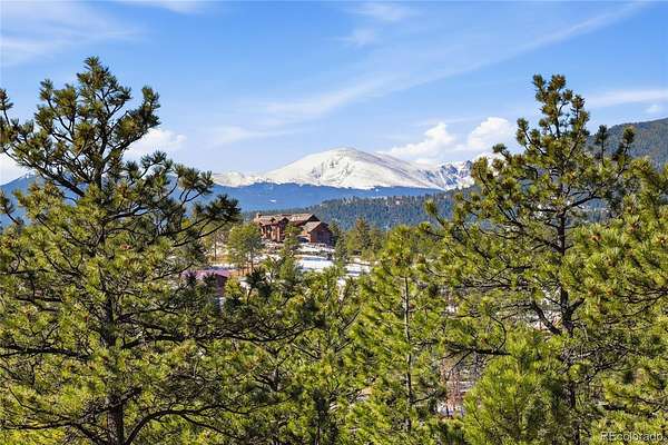 10 Acres of Land with Home for Sale in Evergreen, Colorado