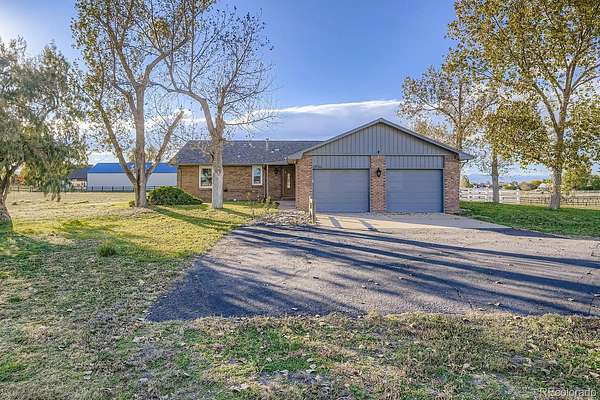 2.53 Acres of Land with Home for Sale in Commerce City, Colorado