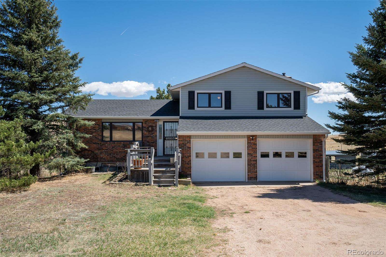 10 Acres of Land with Home for Sale in Larkspur, Colorado