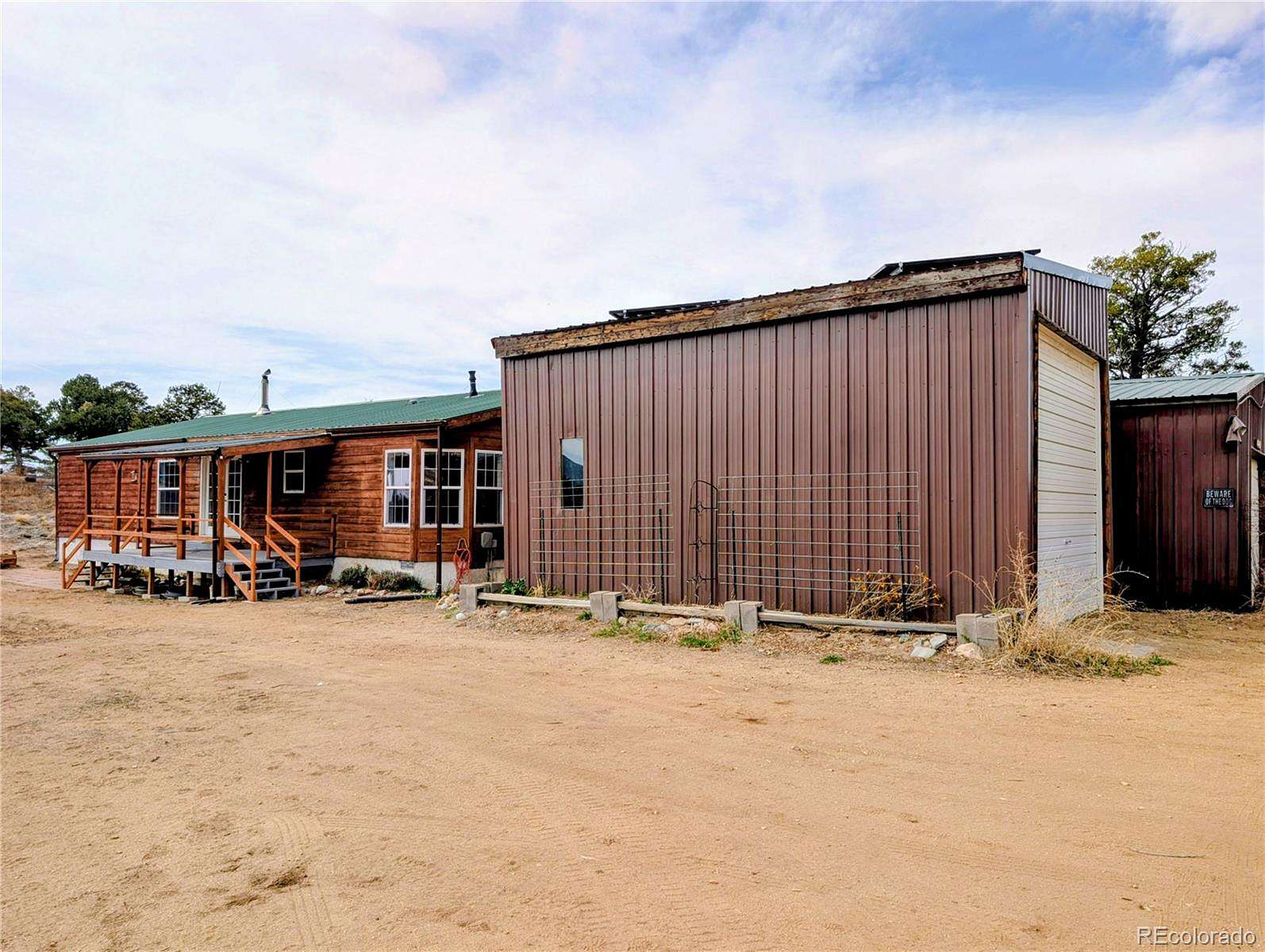 11.8 Acres of Land with Home for Sale in Fort Garland, Colorado