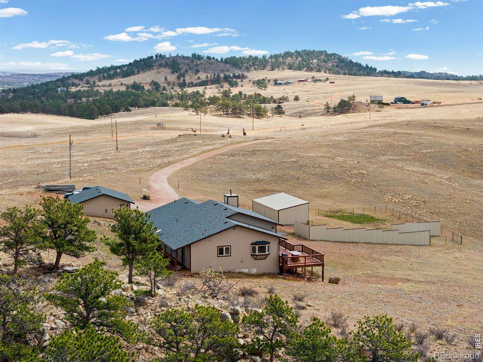 35.6 Acres of Agricultural Land with Home for Sale in Livermore, Colorado