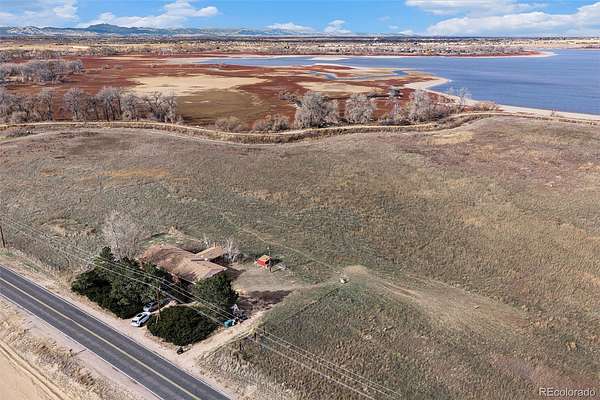 4 Acres of Land with Home for Sale in Commerce City, Colorado