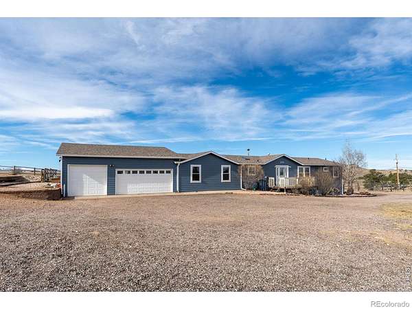 36.2 Acres of Agricultural Land with Home for Sale in Livermore, Colorado